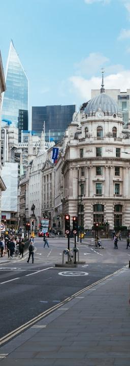 Bond market charts showing yield curves and swap spreads, with geopolitical news headlines in the background.