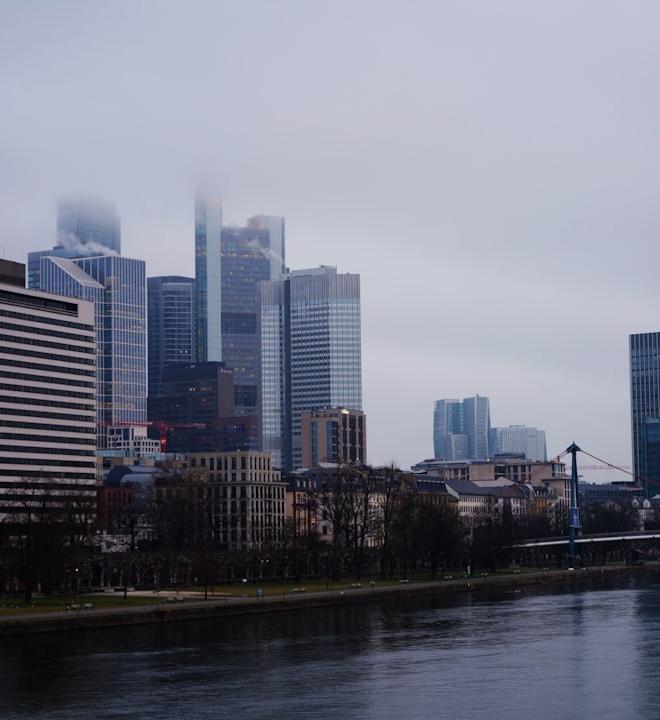 USDCAD currency chart overlaid with policy and commodity flow indicators