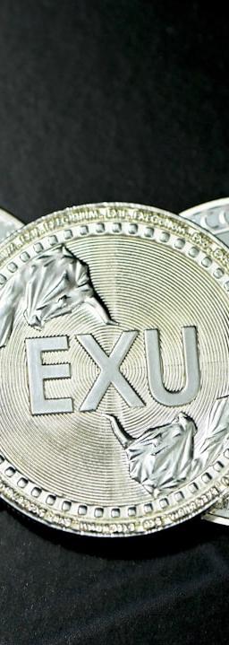 gold and silver round pendant