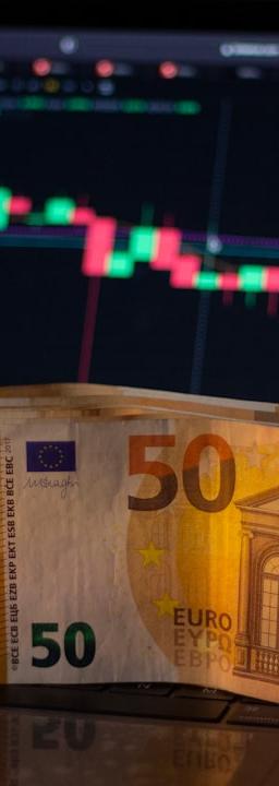 Monad (MON) crypto consolidation on laptop desk, navigating swings & ETF buzz.