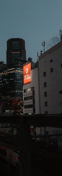 Binance Coin BNB cityscape dusk, regulatory expansion strategy