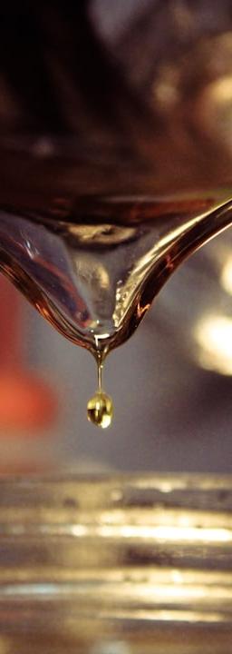 a drop of water falling into a glass of water