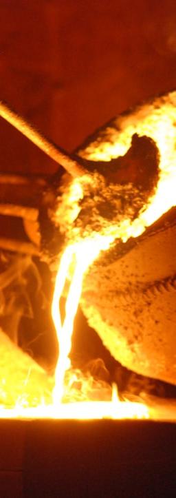 a baseball being made on a fire pit