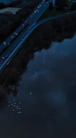 an aerial view of a city at night